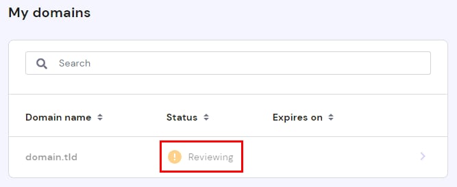 My domains table showing a domain with status Reviewing highlighted