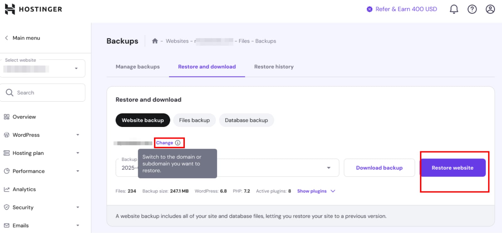 Hostinger website backup restore page with Restore website button and Change domain link highlighted